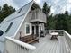 A-frame home with deck, grill, and mountain views at 4375 Tongue Rd, Indian Hills, CO 80454
