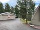 Two-car garage with ample parking and mountain views at 4375 Tongue Rd, Indian Hills, CO 80454