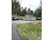 Spacious two-car garage with extra storage space and a large parking area at 4375 Tongue Rd, Indian Hills, CO 80454