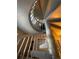 Unique spiral staircase leading to upper level at 4375 Tongue Rd, Indian Hills, CO 80454