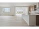 Open-concept living space blends seamlessly with the kitchen, ideal for entertaining at 25303 E Warren Pl, Aurora, CO 80018