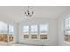 Living room with sliding doors that lead to outdoor area and scenic views at 25303 E Warren Pl, Aurora, CO 80018