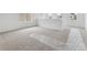 Bright loft area with neutral carpet and large windows providing natural light at 25303 E Warren Pl, Aurora, CO 80018