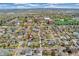 An aerial view showcases the property's neighborhood setting, highlighting proximity to amenities and the surrounding area at 4916 Knox Ct, Denver, CO 80221