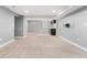 Finished basement featuring neutral carpet and a stylish wet bar area with a sink at 4916 Knox Ct, Denver, CO 80221