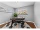 Bright home office with modern desk, decorative rug, and natural light at 4916 Knox Ct, Denver, CO 80221