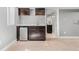 Chic wet bar area showcasing sleek cabinets, a mini-fridge, and elegant countertop at 4916 Knox Ct, Denver, CO 80221