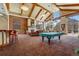 Inviting clubhouse with billiards table, fireplace, and comfortable seating at 5467 Zephyr Ct # 5467, Arvada, CO 80002