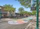 A picturesque street view with inviting outdoor seating and a colorful painted road in Olde Town Arvada at 5467 Zephyr Ct # 5467, Arvada, CO 80002