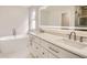 Luxurious bathroom featuring double vanity and soaking tub at 15870 Duckweed Ct, Parker, CO 80134