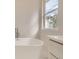 Bright bathroom featuring soaking tub at 15870 Duckweed Ct, Parker, CO 80134