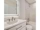 Bright bathroom featuring a modern vanity, sleek fixtures, and a tiled shower-tub combination for a clean, contemporary aesthetic at 15870 Duckweed Ct, Parker, CO 80134