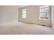 Bright bedroom with two windows at 15870 Duckweed Ct, Parker, CO 80134