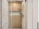 Contemporary shower with rainfall showerhead and tiled walls at 15870 Duckweed Ct, Parker, CO 80134