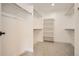 Spacious walk-in closet with ample shelving and hanging space at 15870 Duckweed Ct, Parker, CO 80134