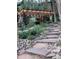 Backyard pergola and stepping stone staircase landscaping at 8171 S Homesteader Dr, Morrison, CO 80465