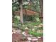 Backyard pergola and stone landscaping at 8171 S Homesteader Dr, Morrison, CO 80465
