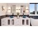 Contemporary bathroom with a double vanity, vessel sinks, modern fixtures, and plenty of storage at 8171 S Homesteader Dr, Morrison, CO 80465