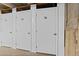 Row of storage units in a common residential parking area at 7201 E Quincy Ave # 102, Denver, CO 80237