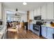 Well-lit kitchen connects to dining and living areas, perfect for entertaining at 3138 N Josephine St, Denver, CO 80205