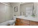 Bathroom features a shower and bath combo and oak vanity at 19216 E Idaho Pl # 102, Aurora, CO 80017