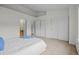 Bright bedroom with carpet flooring has closet storage at 19216 E Idaho Pl # 102, Aurora, CO 80017