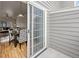 Cozy dining room visible through sliding glass doors leading to an outdoor patio at 19216 E Idaho Pl # 102, Aurora, CO 80017