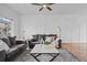 Inviting living room showcasing modern decor, comfortable seating, and a trendy coffee table at 19216 E Idaho Pl # 102, Aurora, CO 80017