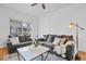 Cozy living room featuring plush sofas, decorative lighting, and stylish accents at 19216 E Idaho Pl # 102, Aurora, CO 80017