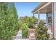 The back yard features lush landscaping and a beautiful patio perfect for outdoor relaxation at 4526 Colorado River Dr, Firestone, CO 80504