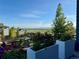 Beautiful backyard view with mature trees, a shed, garden boxes, and a scenic view at 4526 Colorado River Dr, Firestone, CO 80504