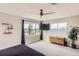 Bedroom with a large window overlooking the backyard at 4526 Colorado River Dr, Firestone, CO 80504