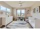 Cheerful Bedroom with natural light, stylish rug, and colorful accents at 4526 Colorado River Dr, Firestone, CO 80504
