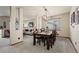 Dining room with a large wooden table and six chairs at 7112 E 131St Pl, Thornton, CO 80602