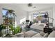 Home office with lots of natural light, modern desk, comfortable chair, and plants at 3061 Low Meadow Blvd, Castle Rock, CO 80109