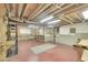 Unfinished basement, ready to be personalized, with visible ducts and open ceilings offer a versatile canvas at 4042 E Hinsdale Cir, Centennial, CO 80122