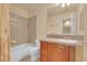 Cozy bathroom with a shower-tub combo and a single vanity sink at 4042 E Hinsdale Cir, Centennial, CO 80122