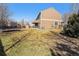 Expansive backyard with a lawn, a trampoline, and a play structure, perfect for outdoor fun at 5224 Snow Goose St, Brighton, CO 80601