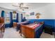 Shared bedroom features matching beds, fun baseball decor, and a cozy atmosphere at 5224 Snow Goose St, Brighton, CO 80601