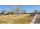 Community park offering grassy area, walking path, picnic tables, and playground equipment at 5224 Snow Goose St, Brighton, CO 80601