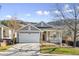 Charming Ranch home with attached 2-car garage and landscaped front yard at 1337 N Ford St, Golden, CO 80403