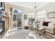 Bright living room with fireplace and access to a deck at 1337 N Ford St, Golden, CO 80403