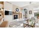 Living room with fireplace and views to backyard at 1337 N Ford St, Golden, CO 80403