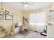 Home office with built-in shelving and window light at 1337 N Ford St, Golden, CO 80403