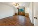 Large bedroom featuring wood floors and an accent wall with tiled detailing at 1460 Belmont Dr, Longmont, CO 80503