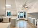 Eat-in kitchen featuring quartz countertops, stainless steel appliances, and plenty of natural light at 1460 Belmont Dr, Longmont, CO 80503