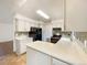 The kitchen has quartz countertops and stainless steel appliances at 1460 Belmont Dr, Longmont, CO 80503