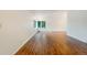 The living room has hardwood floors and a bay window that provides a lot of natural light at 1460 Belmont Dr, Longmont, CO 80503