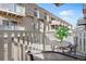 Balcony view with table and chairs; perfect for relaxing outdoors at 7375 E Quincy Ave # 204, Denver, CO 80237