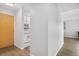 View of entryway, kitchen, and living spaces at 7375 E Quincy Ave # 204, Denver, CO 80237